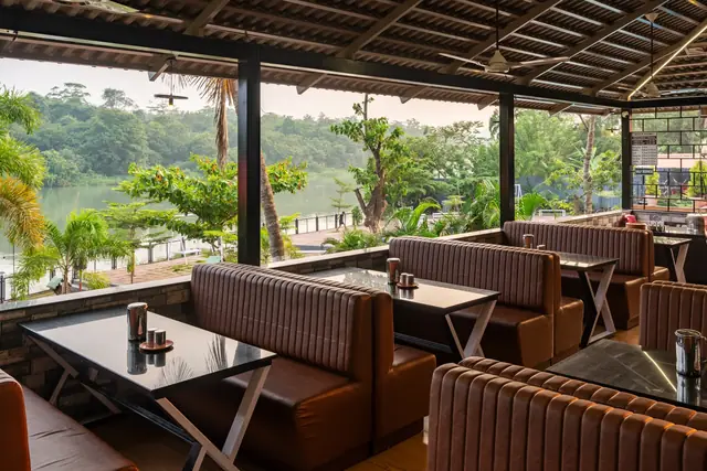 Open-air dining surrounded by greenery